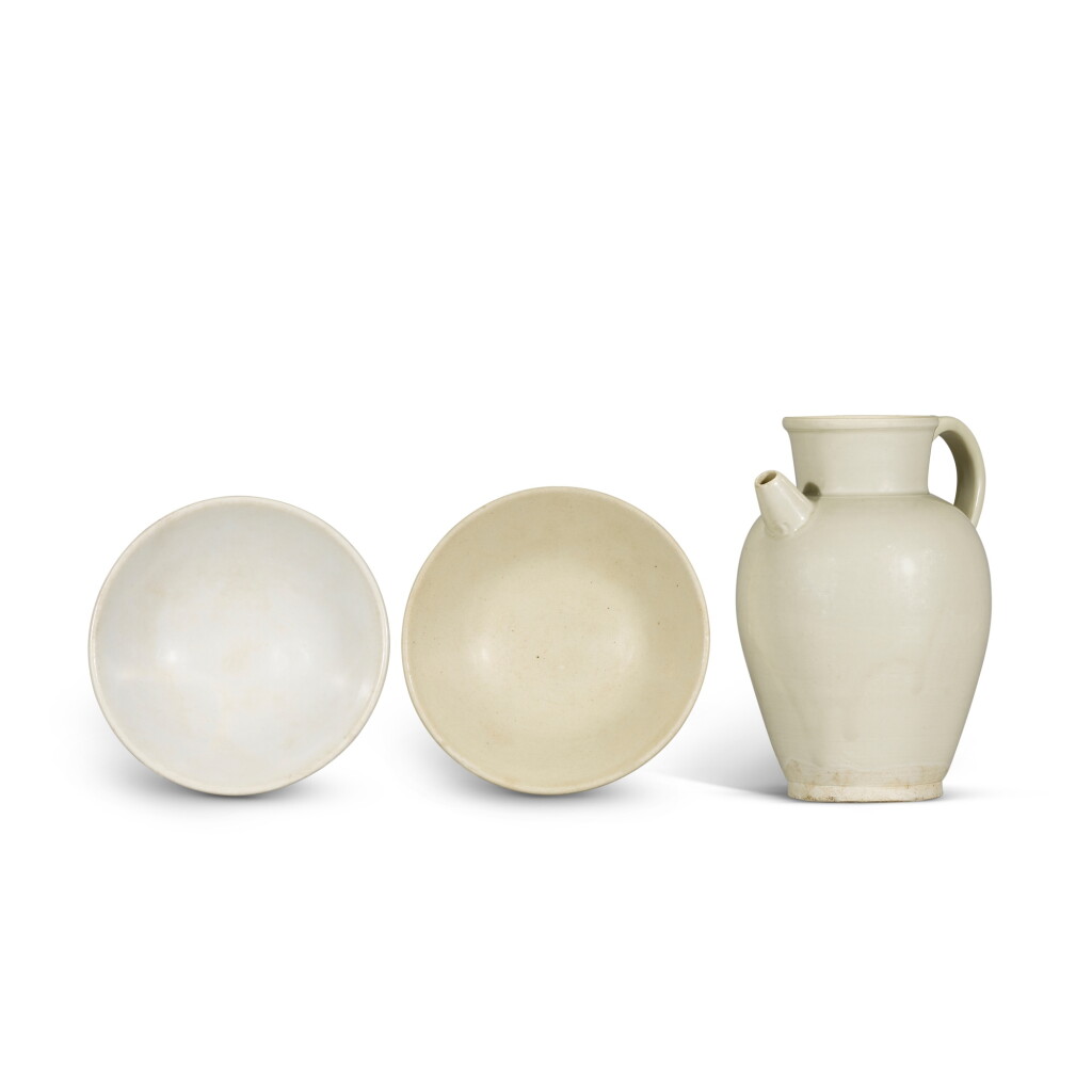 View full screen - View 1 of Lot 230. Two 'Xing' white-glazed dishes, 10th century | 十世紀 邢窰白釉小盤兩件 及 邢窰白釉執壺.