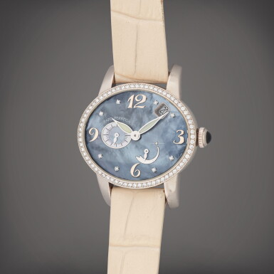View full screen - View 1 of Lot 138. Cat's Eye, Reference 80481 | A white gold and diamond-set wristwatch with date, power reserve indication and mother-of-pearl and diamond-set dial | Circa 2007 .