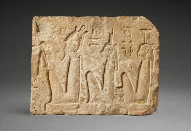 View full screen - View 1 of Lot 131. An Egyptian Indurated Limestone Relief Fragment, 19th/20th Dynasty, 1292-1075 B.C..