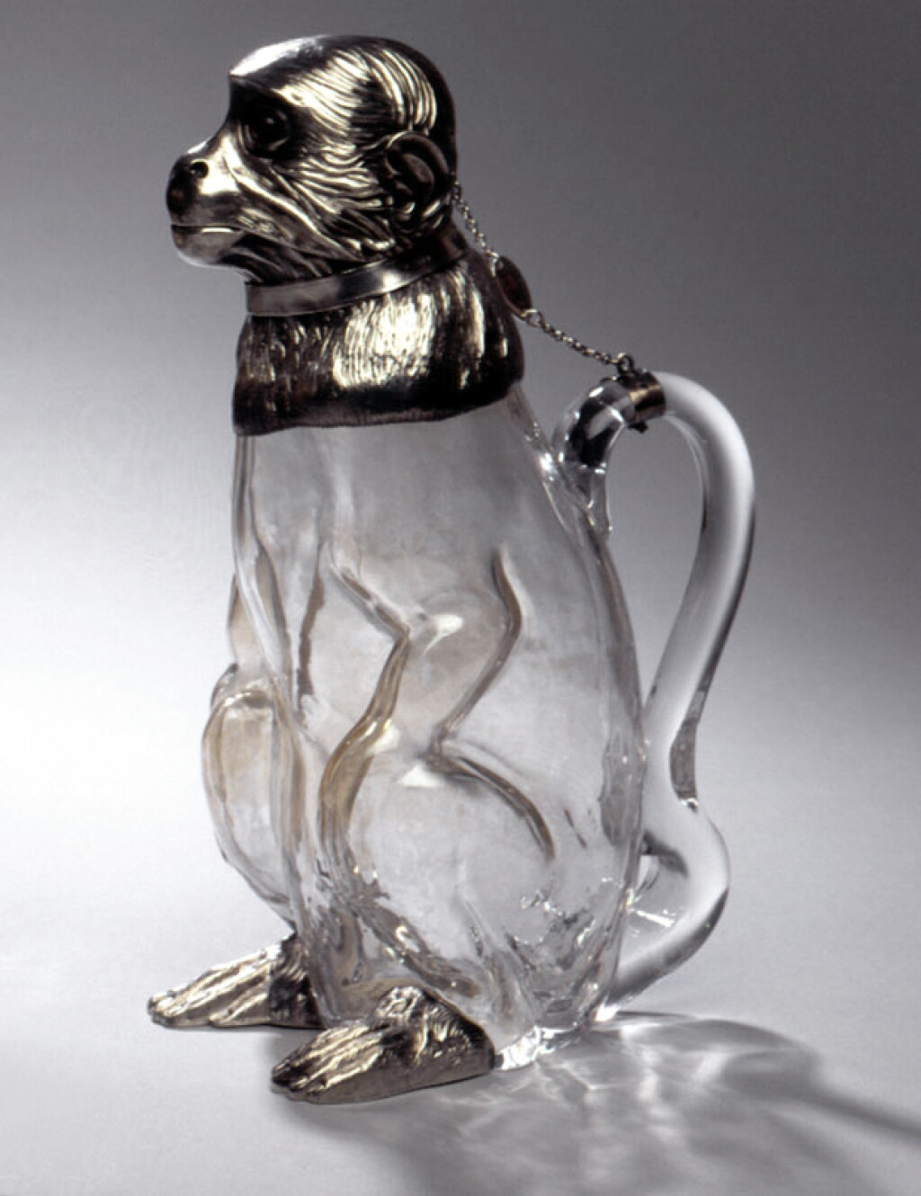 View full screen - View 1 of Lot 331. A Rare Victorian Silver-Mounted "Monkey" Claret Jug, Richard Hodd & Son, London, 1893.