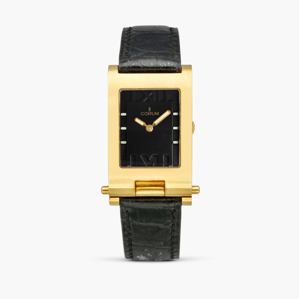 View full screen - View 1 of Lot 8892. Tabogan, Reference 64.151.56 | A yellow gold convertible traveller’s wristwatch, Circa 2000.