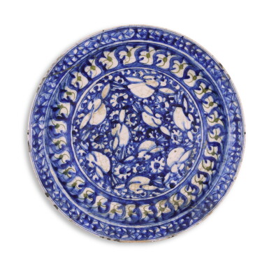 View full screen - View 1 of Lot 248. A Kubachi blue and white pottery bowl, Persia, Safavid, 16th/17th century.