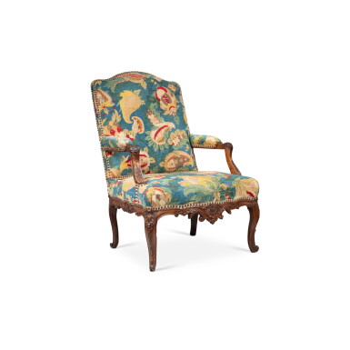 View full screen - View 1 of Lot 131. A Regence wood armchair, circa 1720 | Fauteuil en bois naturel d’époque Régence, vers 1720.
