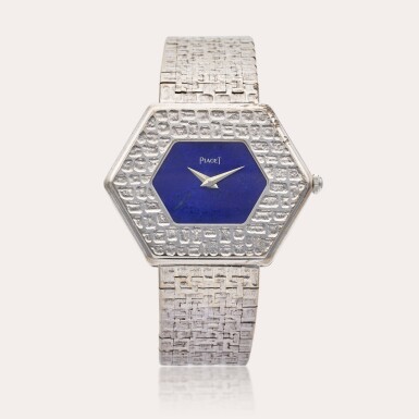 View full screen - View 1 of Lot 383. Reference 99151 A20 | A white gold hexagonal bracelet watch with lapis lazuli dial, Circa 1970 .