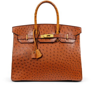 View full screen - View 1 of Lot 653. Brown and Cognac Ostrich Verso Rouge H Birkin 35 Gold Hardware, 2000.