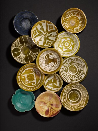 View full screen - View 1 of Lot 123. A group of twelve Abbasid lustre pottery dishes, Iraq, 9th/10th century.
