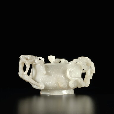 View full screen - View 1 of Lot 648. An openwork pale celadon jade 'chilong' cup, 17th / 18th century | 十七 / 十八世紀 青白玉螭龍紋杯.