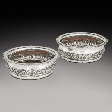 View full screen - View 1 of Lot 401. A pair of Indian Colonial silver wine coasters, George Gordon & Co., Madras, circa 1830.