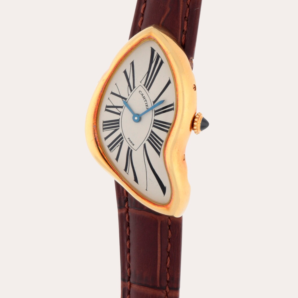 View full screen - View 1 of Lot 50. Crash 'Paris' | A limited edition yellow gold asymmetrical wristwatch | Circa 1991.