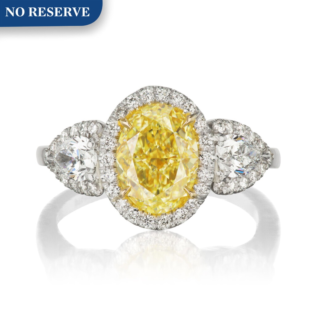 View full screen - View 1 of Lot 47. Harry Winston | Fancy Yellow Diamond and Diamond Ring.