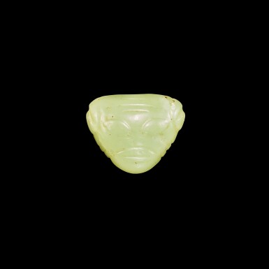 View full screen - View 1 of Lot 3710. A yellowish-celadon jade 'humanoid head' ornament, Neolithic Period, Hongshan culture | 新時期時代 紅山文化 玉人面飾.