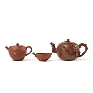 View full screen - View 1 of Lot 88. Two Yixing teapots and covers and a peach-form cup, Qing dynasty .