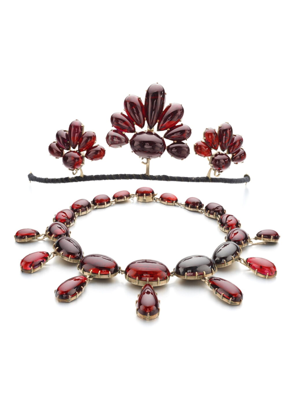 View full screen - View 1 of Lot 1197. Garnet parure, mid-19th century, and a group of garnet jewels.