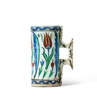 View full screen - View 1 of Lot 19. An Iznik polychrome pottery tankard, Turkey, Ottoman, circa 1590 | Ein polychromer Iznik-Keramik Krug, Türkei, Osmanisch, um 1590.