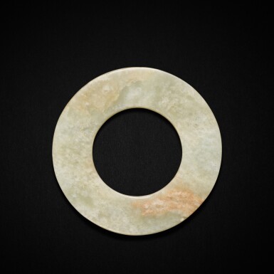 View full screen - View 1 of Lot 9416. A celadon jade circular disc, huan, Neolithic period | 新石器時代 青玉素面環.