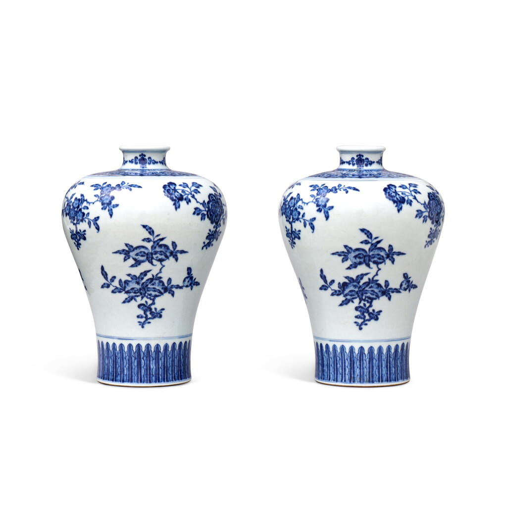 View full screen - View 1 of Lot 131. A pair of Ming-style blue and white 'fruits' vases (Meiping), Seal marks and period of Qianlong.
