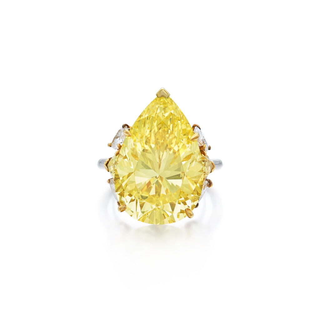 View full screen - View 1 of Lot 15. Fancy Intense Yellow Diamond, Colored Diamond and Diamond Ring.