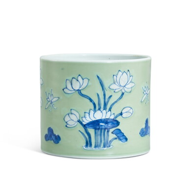 View full screen - View 1 of Lot 314. A celadon-ground underglaze-blue 'lotus pond' brushpot, Qing dynasty, Kangxi period 清康熙 粉青地青花荷塘紋筆筒.