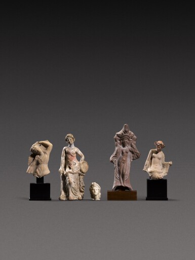 View full screen - View 1 of Lot 157. A Collection of Five Terracottas, Hellenistic and Roman, circa late 4th Century B.C/1st Century A.D..