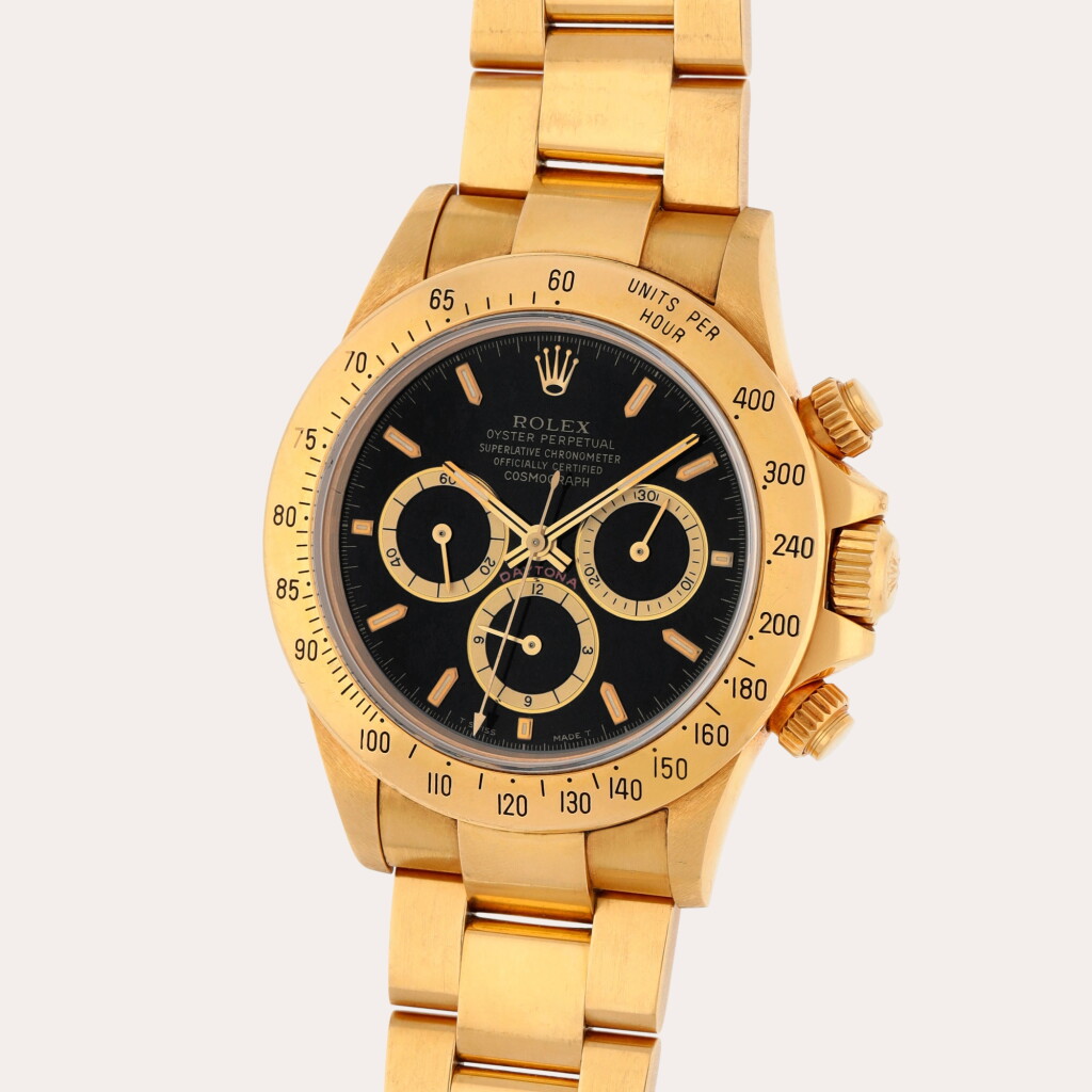 View full screen - View 1 of Lot 76. Daytona 'Zenith', Reference 16528 | A yellow gold chronograph wristwatch with bracelet | Circa 1990 .