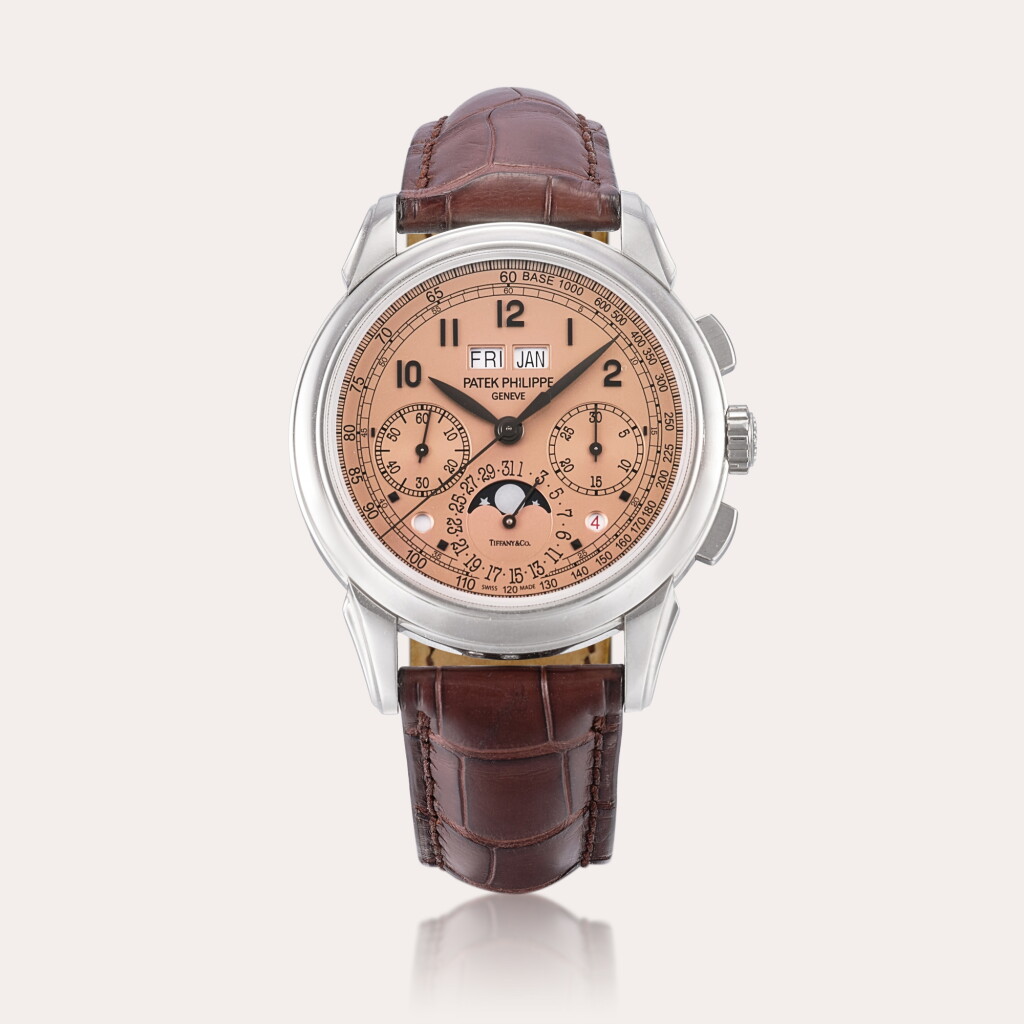 View full screen - View 1 of Lot 2299. Reference 5270 | A platinum perpetual calendar chronograph wristwatch with moon phases, leap year and day and night indication and salmon dial, Retailed by Tiffany & Co., Circa 2018.