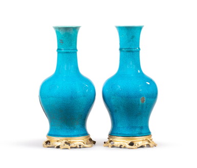 View full screen - View 1 of Lot 166. A pair of gilt-bronze mounted blue enameled porcelain vases, China, 18th century and Louis XV style, 19th century | Paire de vases en porcelaine émaillée bleu turquoise, Chine, XVIIIe siècle et monture de bronze doré de style Louis XV, XIXe siècle.