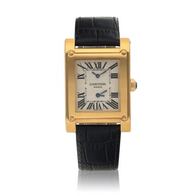 View full screen - View 1 of Lot 39. Cartier 'CPCP' Tank à Vis, Ref. 2551 Yellow gold dual time zone wristwatch Circa 2002.