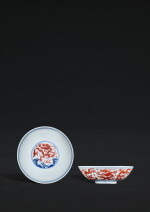 A pair of iron-red and underglaze-blue 'dragon' shallow bowls, Marks and period of Wanli | 明萬曆 青花礬紅彩海水雲龍紋淺盌一對 《大明萬曆年製》款