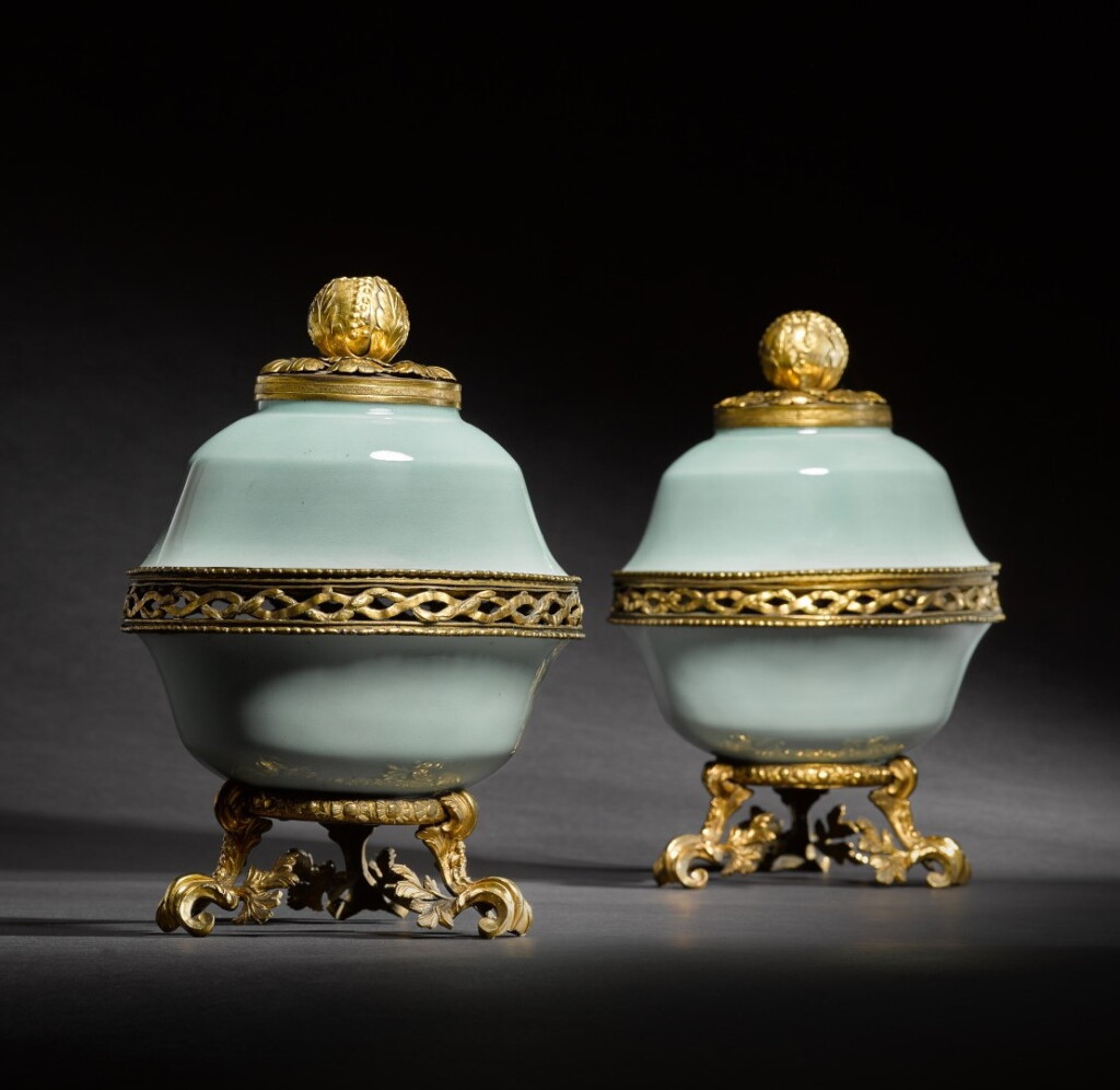 View full screen - View 1 of Lot 21. A pair of early Louis XV gilt-bronze and gilt-metal-mounted Chinese celadon-ground pot-pourri bowls and covers, the porcelain Qianlong mark and period.