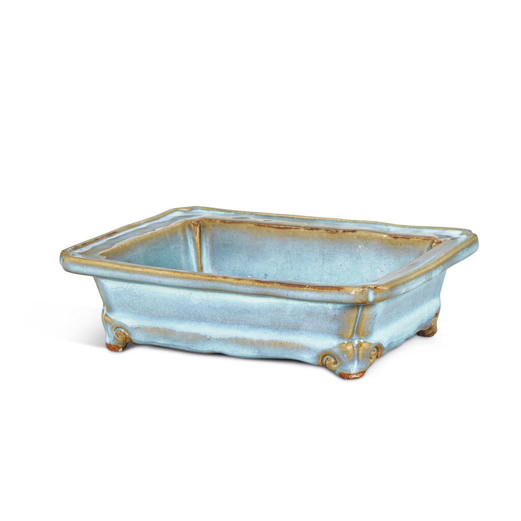 View full screen - View 1 of Lot 3669. A Junyao rectangular jardinière stand, Early Ming dynasty | 明初 鈞窰天藍釉長方倭角花盆托 「十」字款.