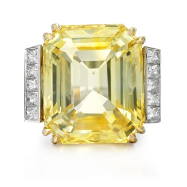 View full screen - View 1 of Lot 64. YELLOW SAPPHIRE AND DIAMOND RING.