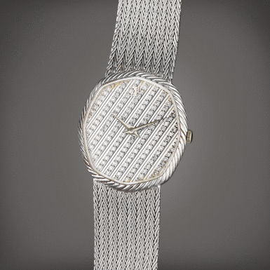 View full screen - View 1 of Lot 67. Reference 4062BC | A white gold and diamond-set bracelet watch, Circa 1984.