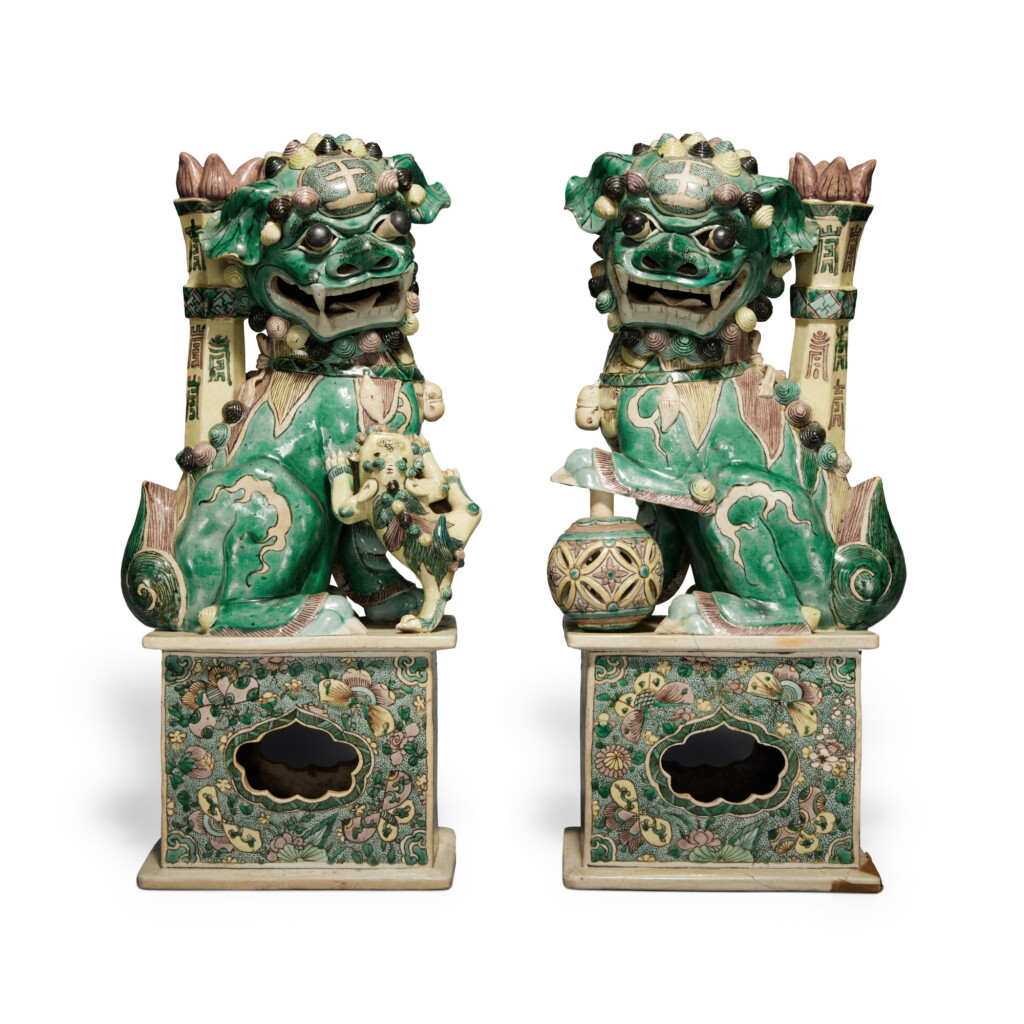View full screen - View 1 of Lot 635. A pair of famille-verte 'Buddhist lion' joss stick holders, Qing dynasty, 19th century | 清十九世紀 素三彩佛獅香插一對.