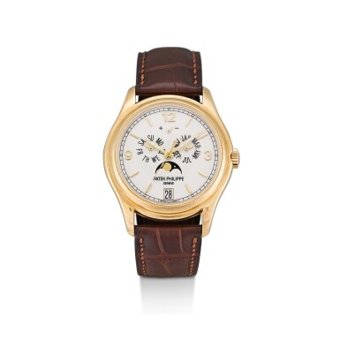 View full screen - View 1 of Lot 8237. PATEK PHILIPPE | REFERENCE 5146 A YELLOW GOLD ANNUAL CALENDAR WRISTWATCH WITH MOON PHASES AND POWER RESERVE INDICATION, CIRCA 2008.