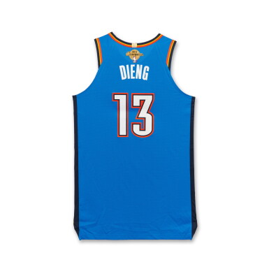 View full screen - View 1 of Lot 20. Ousmane Dieng Oklahoma City Thunder 2025-2026 NBA Tip-Off Game Issued Icon Edition Jersey | Ring Night | 2024-25 Championship Patch.