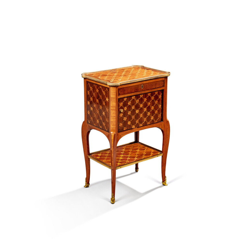 View full screen - View 1 of Lot 98. A Louis XV gilt-bronze mounted tulipwood, satinwood, barberry and holly writing table, circa 1770, stamped by Roger Vandercruse known as La Croix.