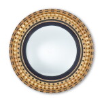 A Regency Gilt and Ebonized Wood Convex Mirror, first half 19th century