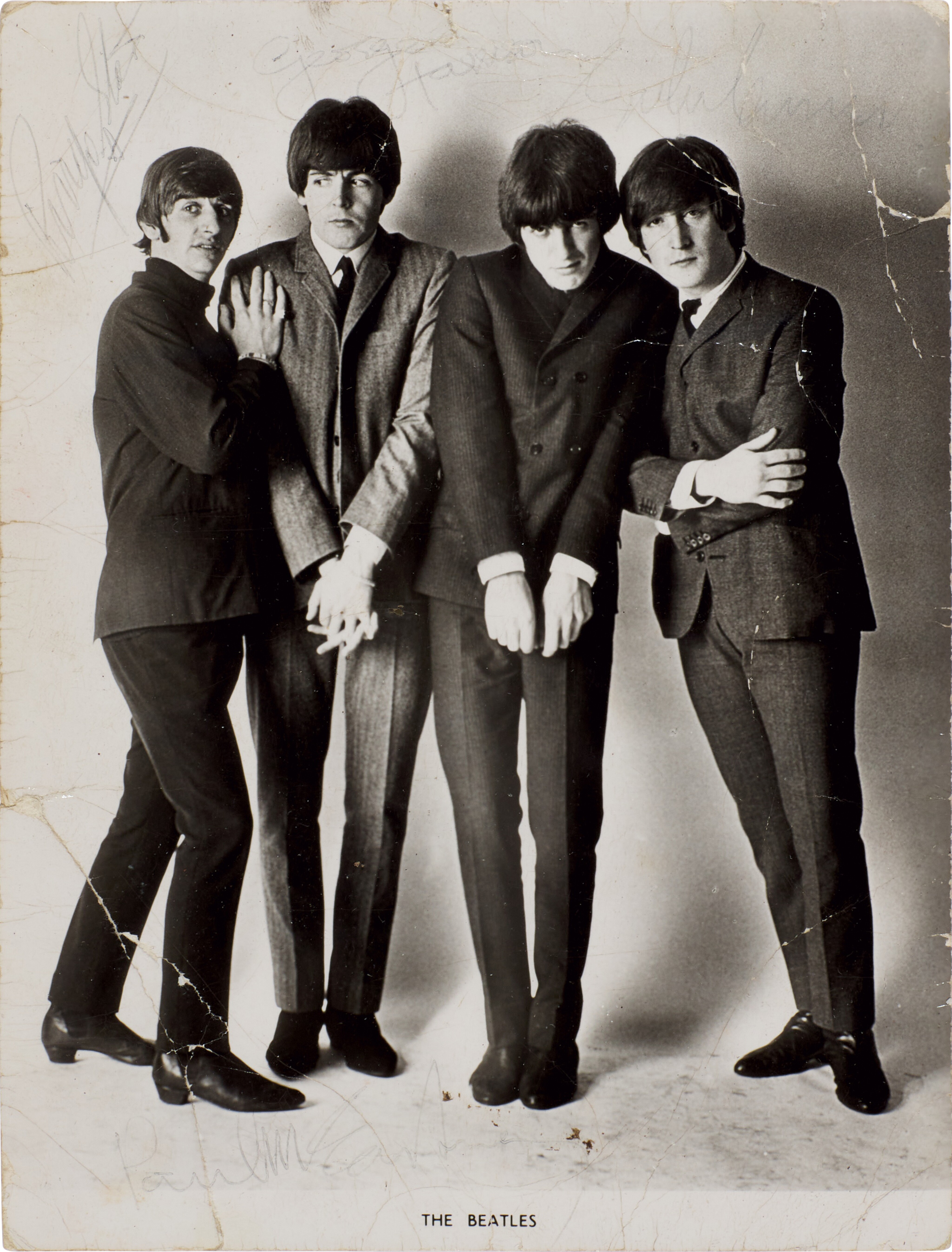 beatles dressed in black The Beatles' first contract with Brian Epstein to be auctioned