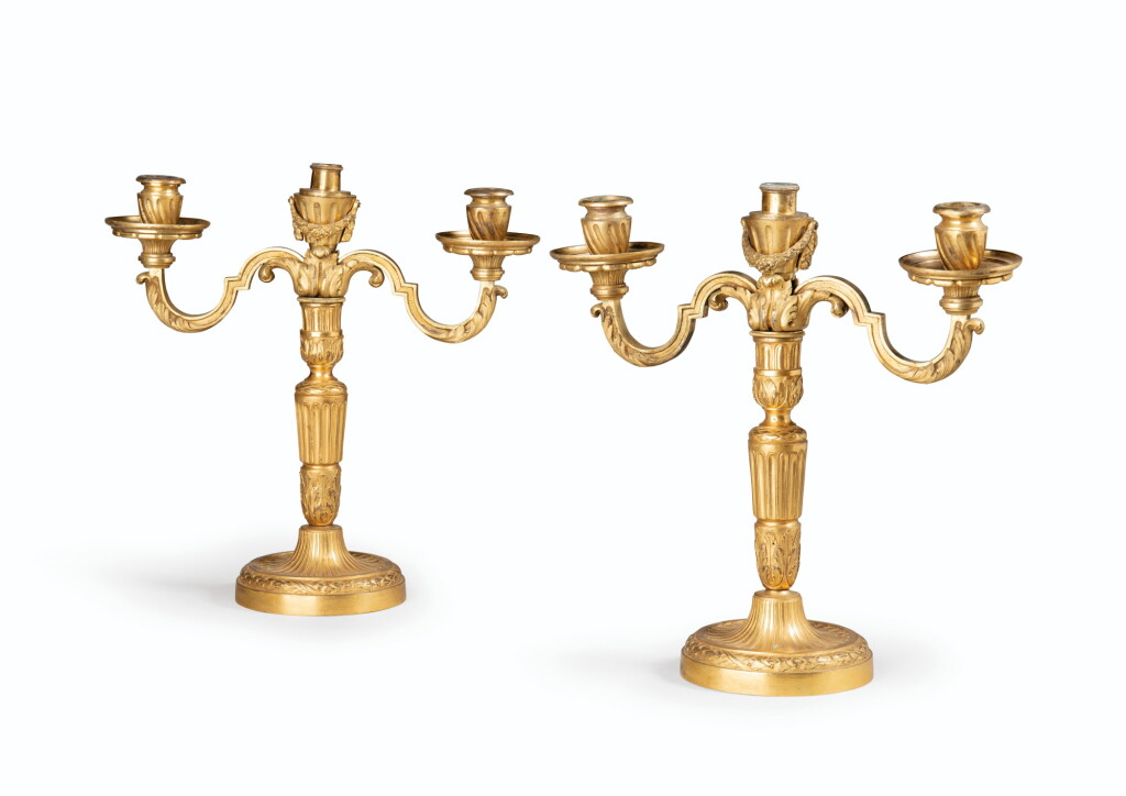 View full screen - View 1 of Lot 95. A PAIR OF LOUIS XVI STYLE GILT-BRONZE CANDELABRA | PAIRE DE CANDÉLABRES EN BRONZE DORÉ DE STYLE LOUIS XVI .