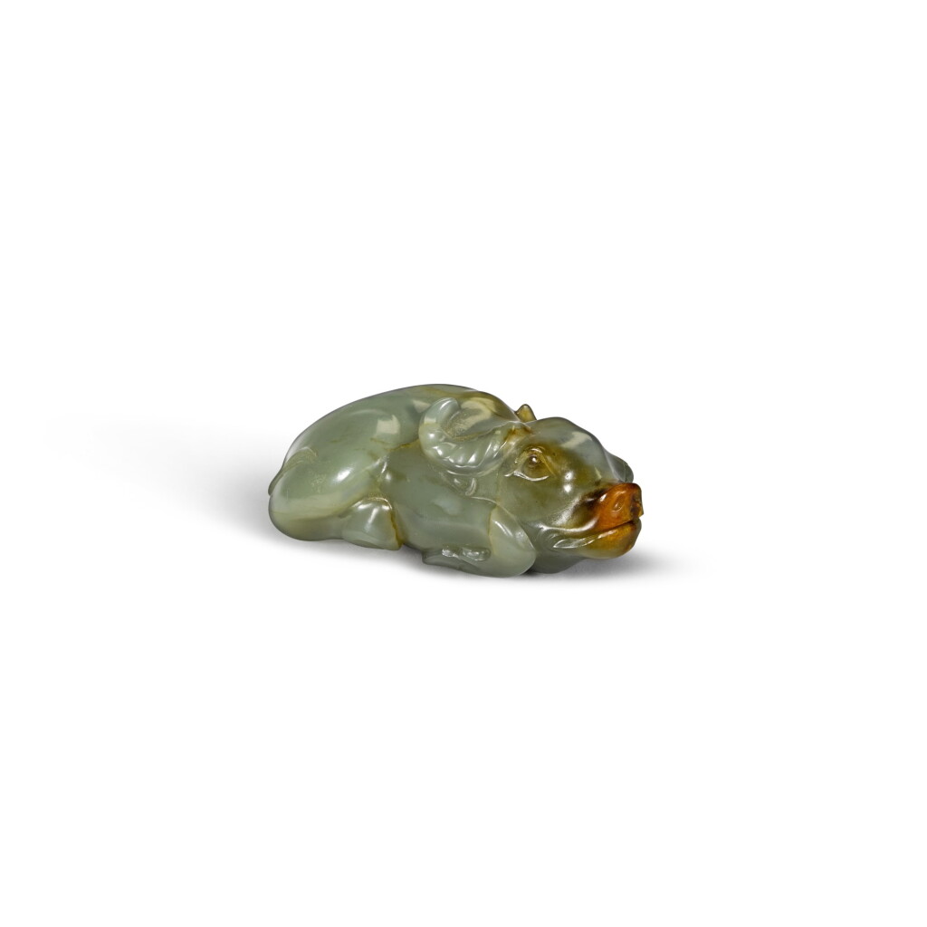 View full screen - View 1 of Lot 36. A small celadon jade figure of a recumbent buffalo Late Qing dynasty | 清末 青玉臥牛.