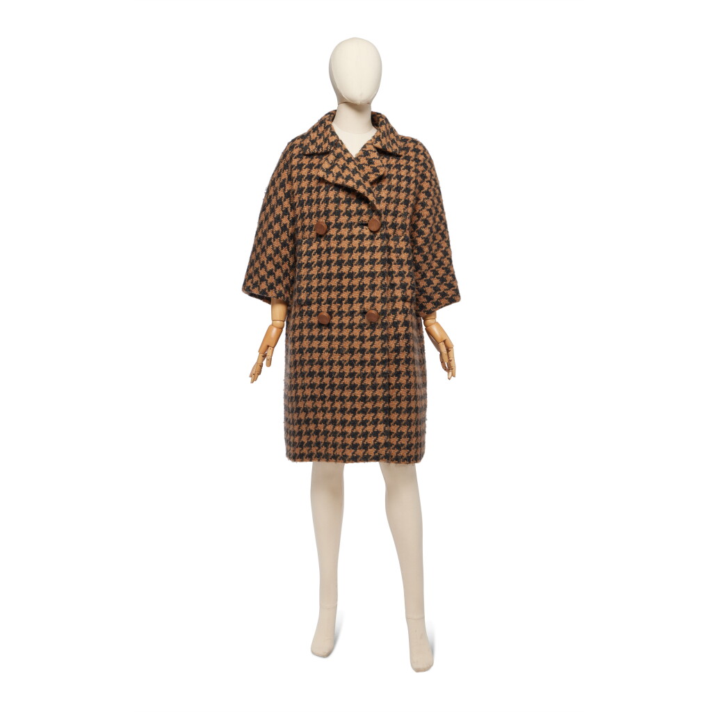 View full screen - View 1 of Lot 65. Haute Couture Black and Brown Houndstooth Check Wool Coat, Early 1960s.