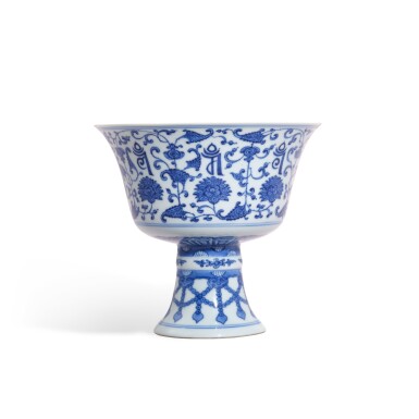 View full screen - View 1 of Lot 3328. A blue and white 'lança' stem cup, Seal mark and period of Qianlong | 清乾隆 青花梵紋纏枝番蓮紋高足盌 《大清乾隆年製》款.