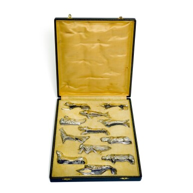 View full screen - View 1 of Lot 53. A cased set of twelve electroplate Art Deco knife rests, unmarked, probably French, circa 1930.