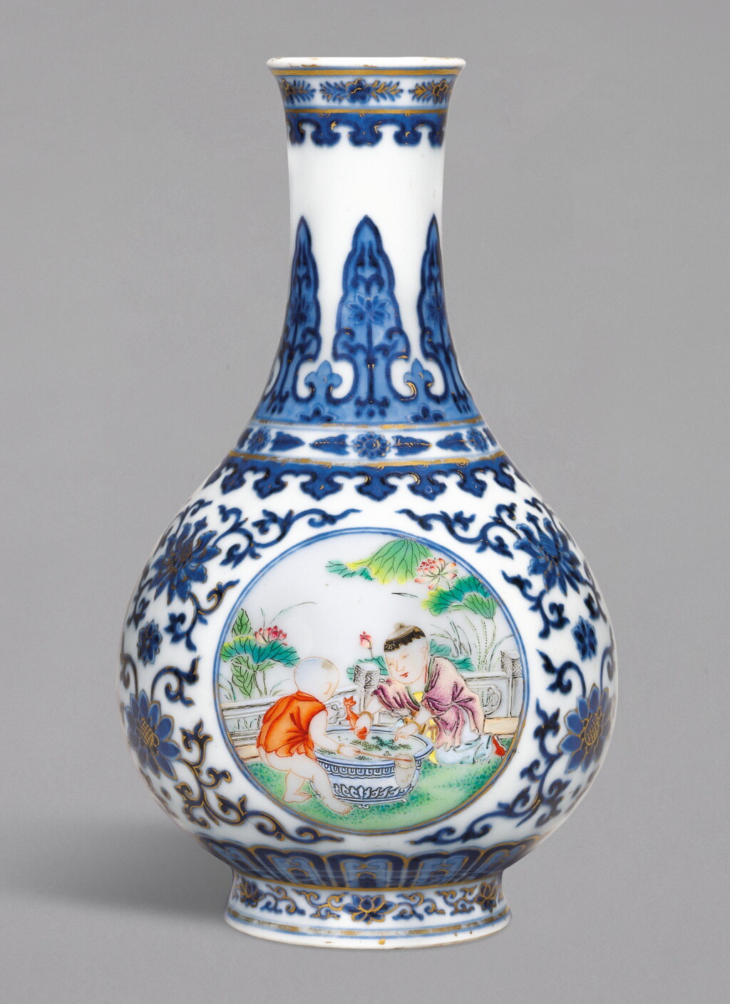 View full screen - View 1 of Lot 8. A VERY RARE UNDERGLAZE-BLUE, FAMILLE-ROSE AND GILT-DECORATED 'BOYS MEDALLION' VASE, QIANLONG SEAL MARK AND PERIOD | 清乾隆 青花描金粉彩開光嬰戲圖小瓶 《大清乾隆年製》款.