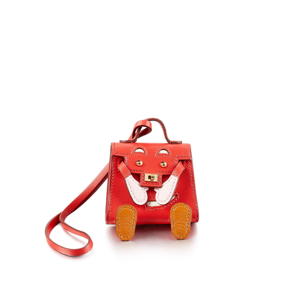 View full screen - View 1 of Lot 8361. Sanguine Tadelakt Kelly Doll Bag Charm Palladium Hardware, 2021 .