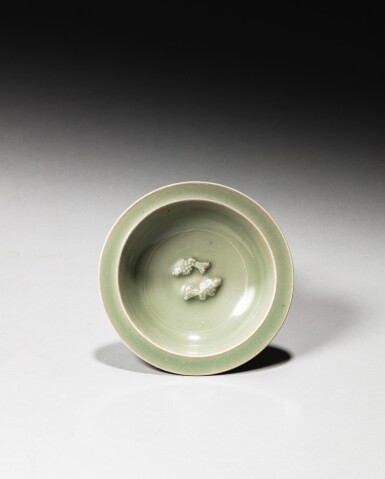 View full screen - View 1 of Lot 44. A 'Longquan' celadon-glazed 'twin fish' dish, Southern Song dynasty | 南宋 龍泉青釉印雙魚折沿盤.