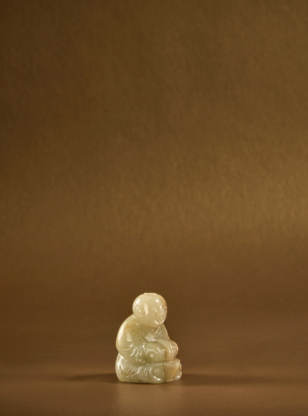 View full screen - View 1 of Lot 128. A small pale green jade carving of a tea grinder, Northern Song dynasty.