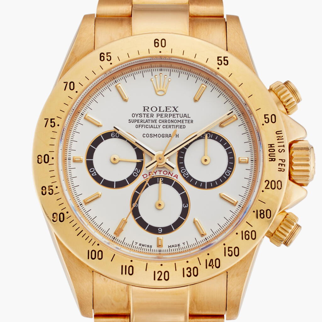 View full screen - View 1 of Lot 6. Reference 16528 'Floating Cosmograph Zenith' Daytona | An early yellow gold automatic chronograph wristwatch with bracelet, Circa 1989.