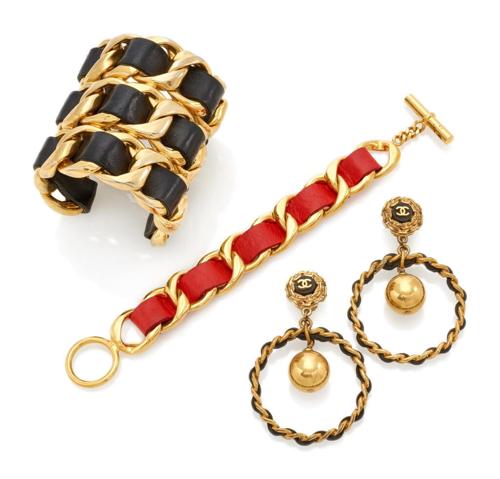 View full screen - View 1 of Lot 148. Black and Red Lambskin Threaded Gold Plated Earrings, Bracelet and Cuff. Cir 1980's (Un paio di orecchini e due bracciali, 1980).