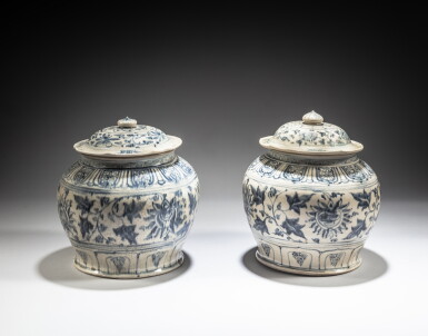 View full screen - View 1 of Lot 130. Two blue and white 'lotus' jars and covers, Vietnam, Lê dynasty, 15th / 16th century | 越南 黎朝 十五 / 十六世紀 青花纏枝蓮紋蓋罐一組兩件.